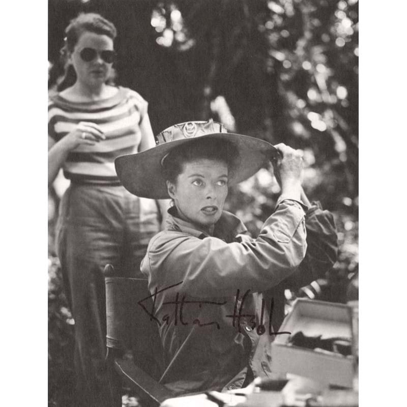 Black and white photograph of Katharine Hepburn on the set of 'The African Queen', signed 'Katharine Hepburn', 1951