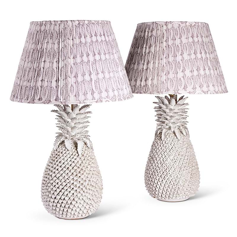 A pair of white ceramic pineapple lamps, modern