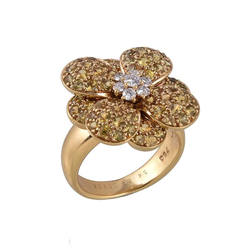 A diamond and yellow sapphire flower ring by Van Cleef & Arpels 