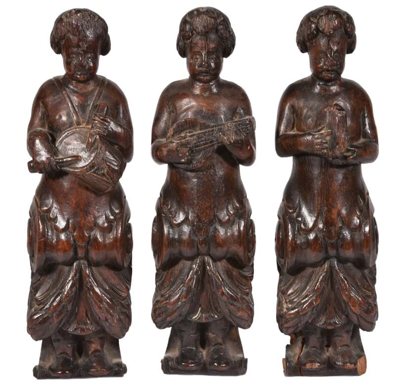 Inline Image - Lot 68, three northern European late 17th century carved term figures of musicians; est. £500-800 (+fees)
