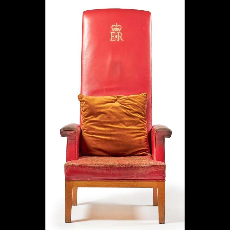Lot 152: A red leather high back armchair, third quarter 20th century