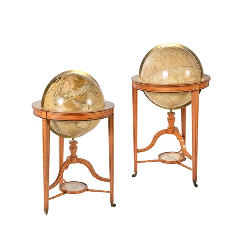 Y A very fine pair of Regency twenty-one inch terrestrial and celestial floor-standing library globes J. & W. Cary, London, the celestial dated 1799, the terrestrial dated 1815/1823
