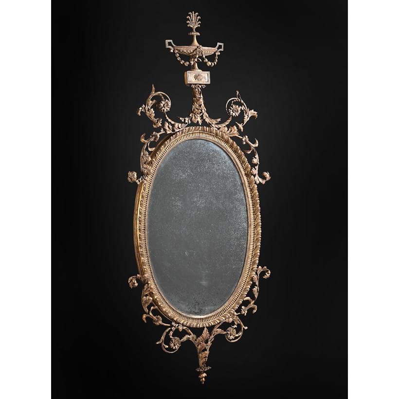 Inline Image - Lot 205: A George III carved giltwood wall mirror, after designs by Robert Adam, circa 1770 | Est. £25,000-40,000 (+ fees)