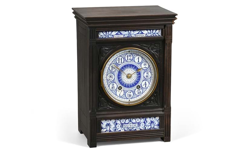 Inline Image - Lot 251: An Aesthetic Movement ebonised and porcelain inset mantel clock, circa 1890, attributed to Lewis Forman-Day | Est. £250-350 (+ fees)