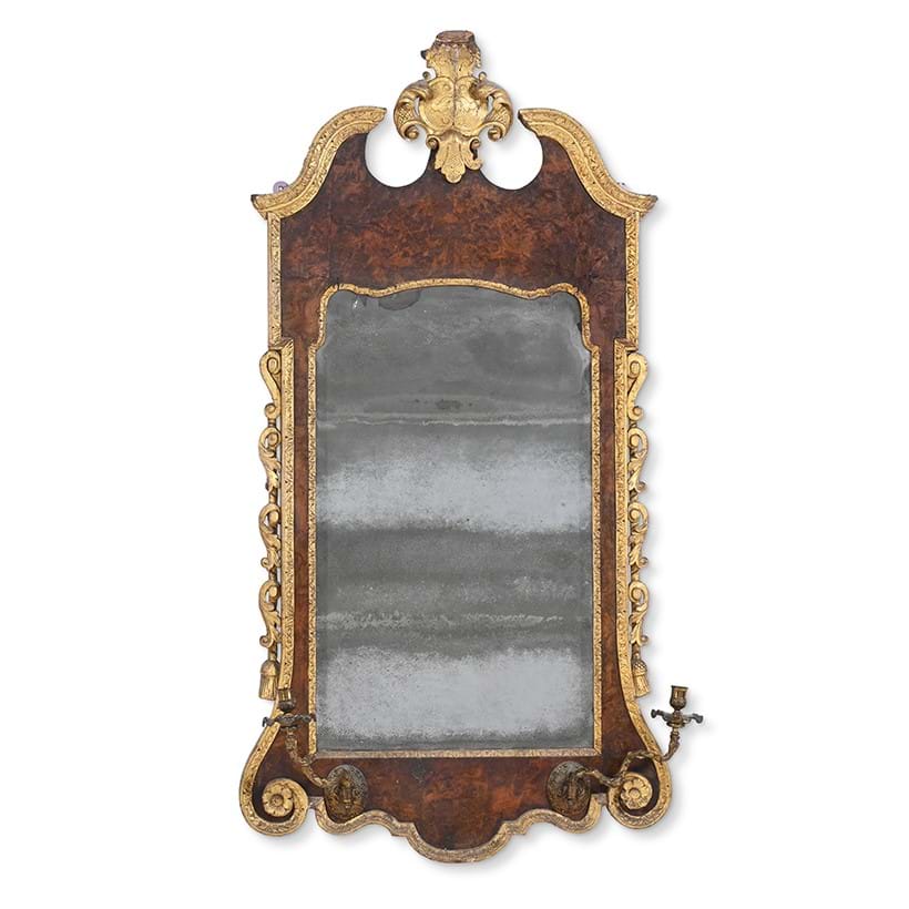Inline Image - Lot 34: A George I burr walnut and parcel gilt girandole mirror, circa 1720 | Est. £5,000-7,000 (+ fees)