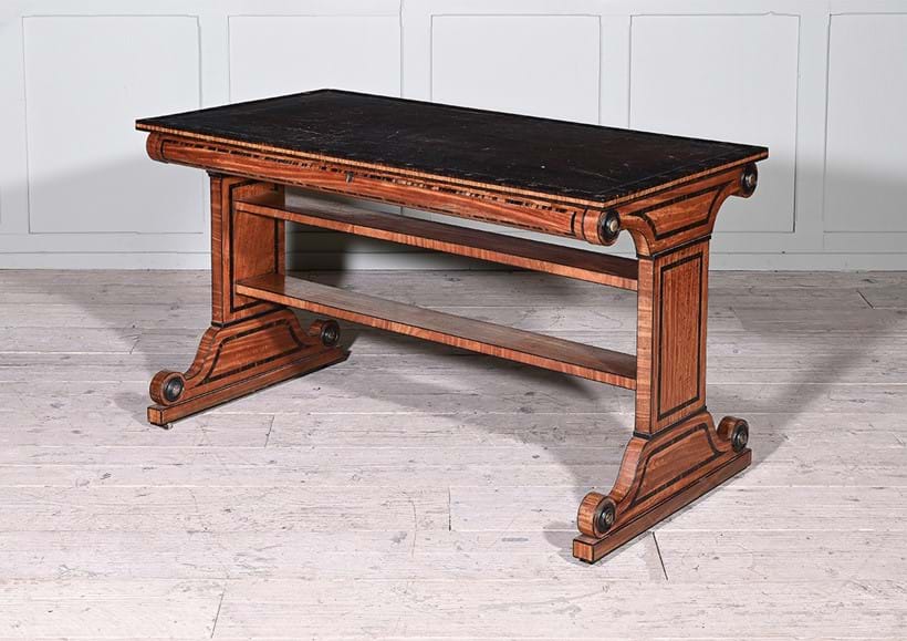 Inline Image - Lot 75: Y A fine Regency satinwood and macassar ebony library table, attributed to George Oakley, circa 1805-1810 | Est. £10,000-15,000 (+ fees)