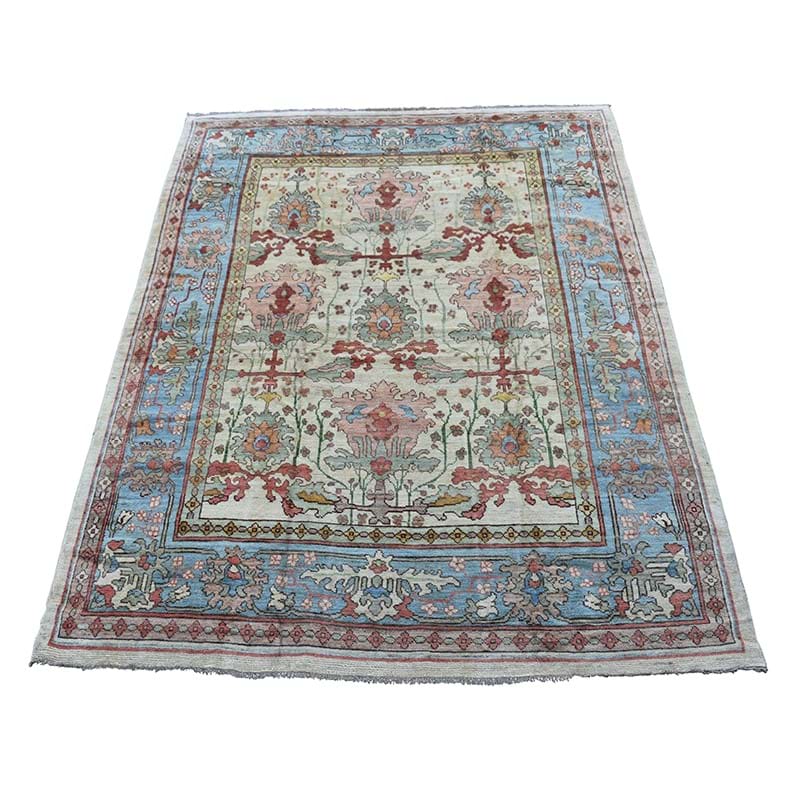 An Ushak carpet, after designs by C.F.A. Voysey
