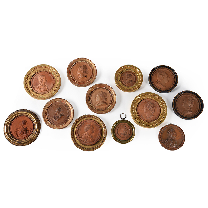 A set of thirteen 18th century Italian terracotta portrait medallions by Jean-Baptiste Nini (1717-1786)