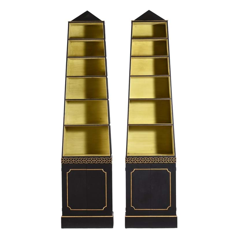 Inline Image - Lot 234: A pair of ebonised and parcel gilt 'pyramid' open bookcases, in Regency style, by John Fowler, mid 20th century | Est. £2,000-3,000 (+ fees)
