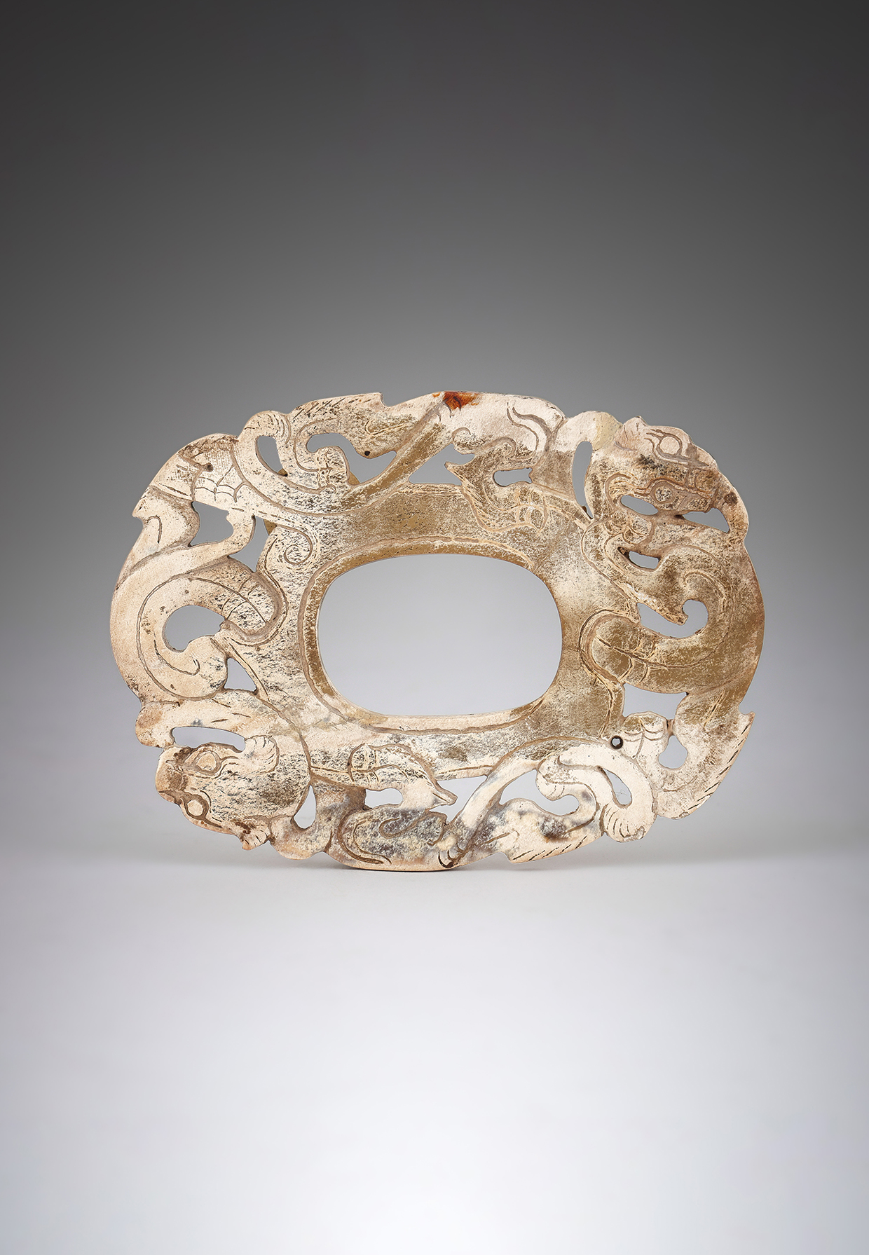 Inline Image - Lot 400: A Chinese calcified 'Chicken Bone' jade plaque, Warring States-Han Period (475 BC-220 AD) | Est. £2,000-3,000 (+ fees)