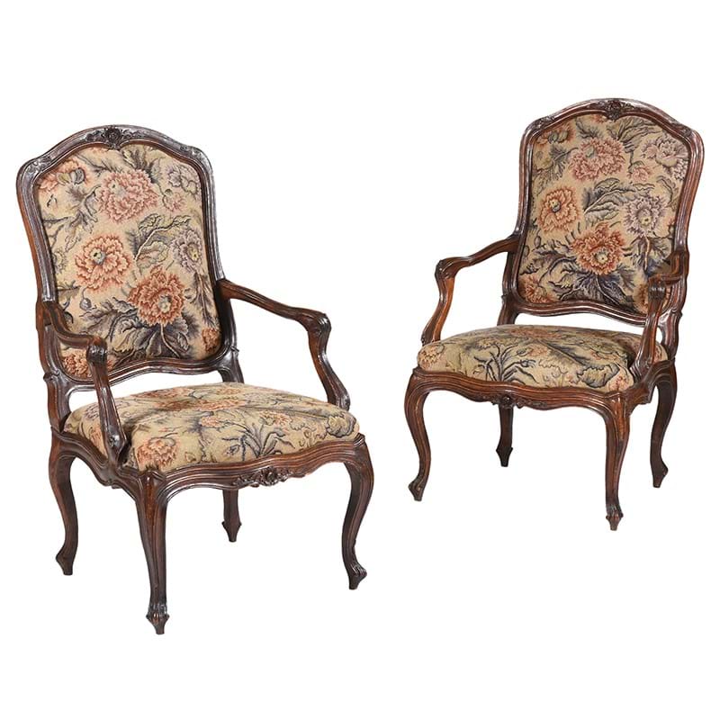 A pair of beech and upholstered armchairs, possibly Genoese, mid 18th century