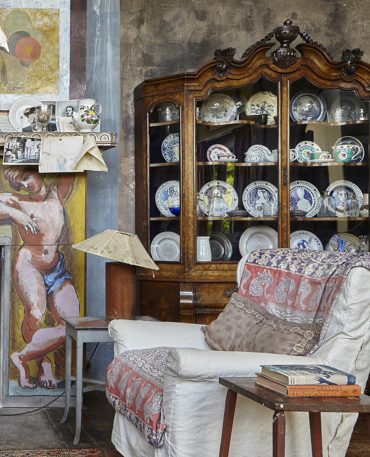 Inline Image - With thanks to Gavin Kingcome Photography for providing the photograph of Vanessa Bell & Duncan Grant's studio at Charleston Farmhouse in East Sussex which shows the floral decorated teapot still sitting on the mantlepiece today