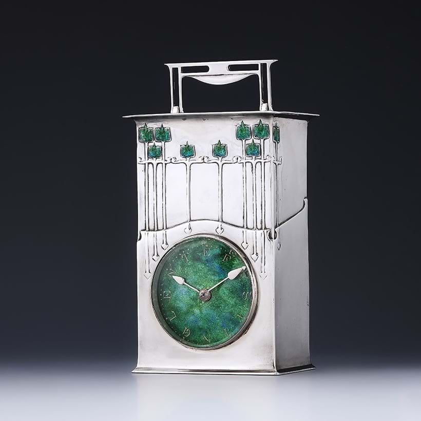 Inline Image - A Silver and Enamel 'Magnus' Cymric Clock, designed by Archibald Knox | Sold for £27,700