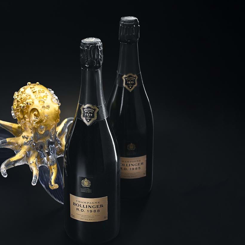 Inline Image - L: 1988 Bollinger RD, 2 bottles | Sold for £480 incl. & R: 1985 Bollinger RD, 1 bottle  | Sold for £240 incl.