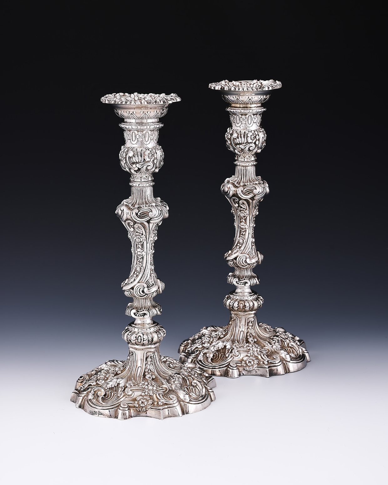 Inline Image - Lot 35: A pair of late Victorian silver candlesticks, Walker & Hall, Sheffield 1897 | Est. £600-800 (+ fees)