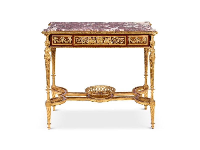 A French Ormolu-Mounted Amaranth and Patridge Wood Centre Table After The Model By Adam Weisweiler