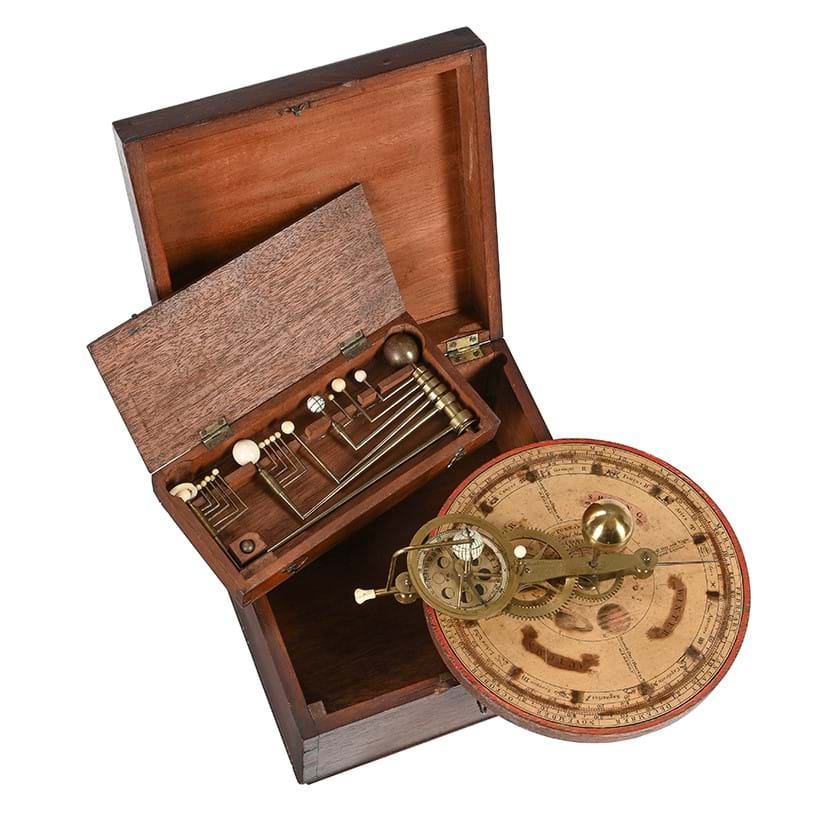 Inline Image - Lot 1001: A fine Regency lacquered brass and mahogany 'portable orrery' and tellurian, William Jones, London, circa 1815 | Est. £3,000-5,000 (+ fees)