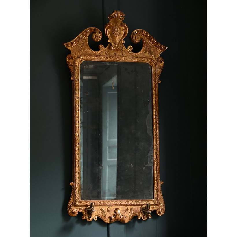 Inline Image - Lot 87: An early George II giltwood mirror, in a manner of John Belchier, circa 1730 | Est. £3,000-5,000 (+ fees)