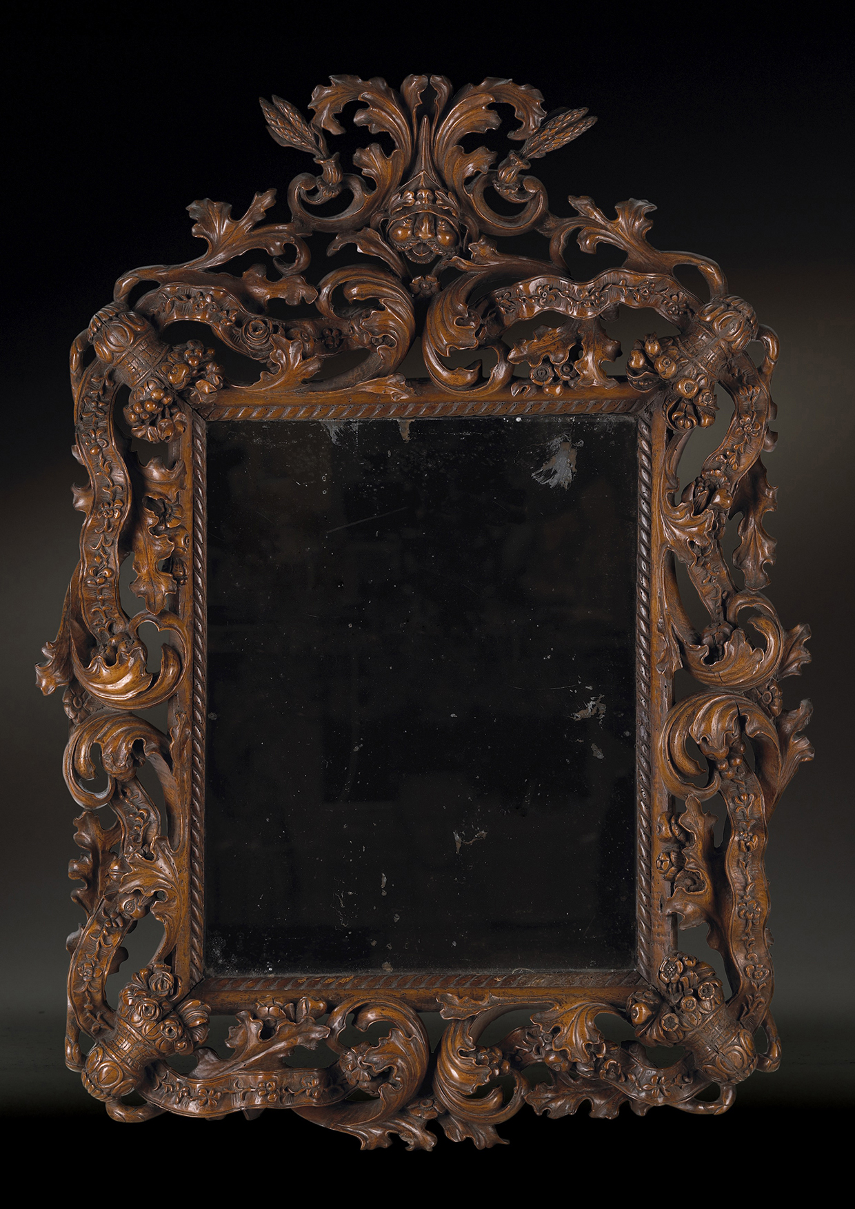 Inline Image - Lot 148: An Italian carved fruitwood mirror, Venice, late 17th century, in the manner of Andrea Brustolon | Est. £15,000-25,000 (+ fees)