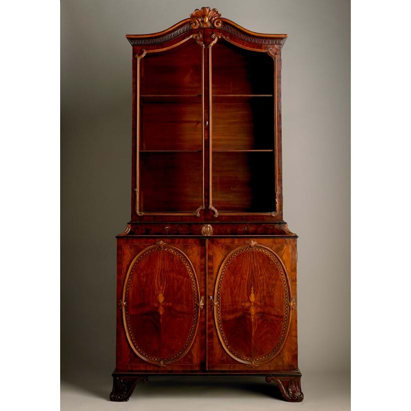 Inline Image - Lot 239: A George III mahogany, padouk, marquetry and ebonised bookcase designed by and attributed to John Linnell, circa 1765 | Est. £20,000-30,000 (+ fees)