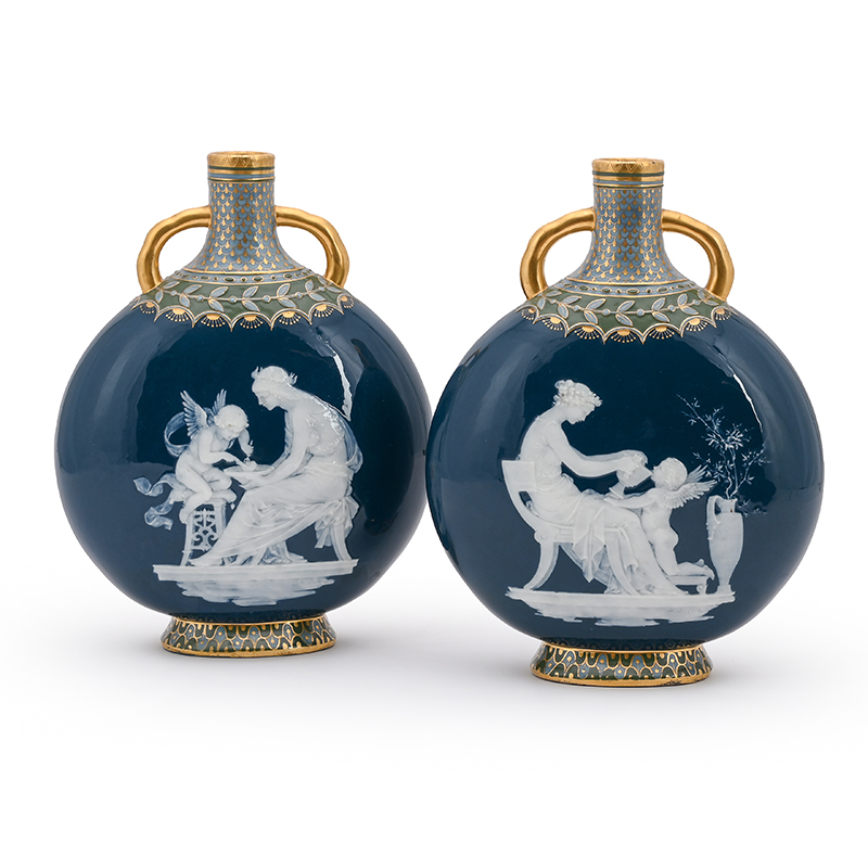 A fine pair of Minton pâte sur pâte moon flasks, by Marc-Louis Solon, late 19th or early 20th century