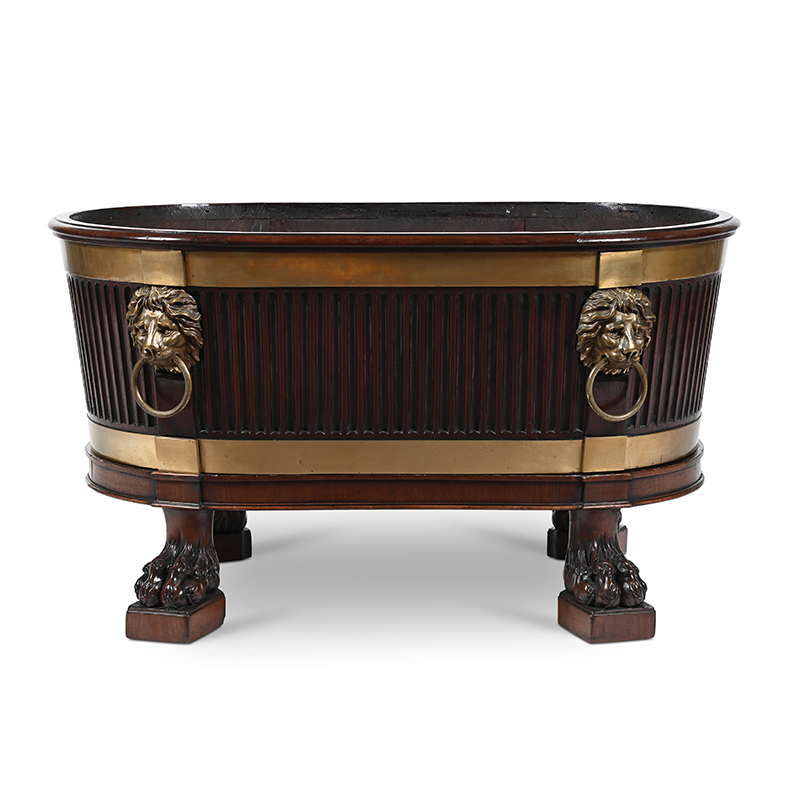 A George III mahogany and brass mounted wine cooler, after a design by Robert Adam, circa 1780