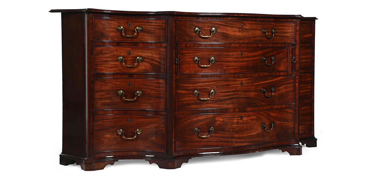 Lot 170 - a George III serpentine commode in the manner of Thomas Chippendale.jpg