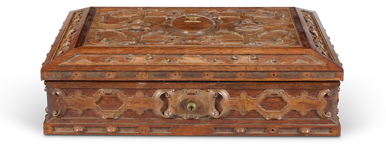 Lot 118 - A carved oak and walnut 'antiquarian' box, second quarter 19th century, in the manner of Richard Bridgens.jpg