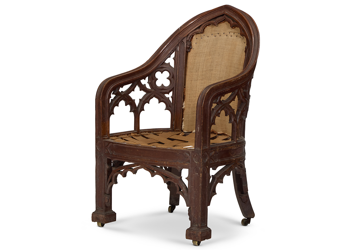 Lot 210 - A George III Gothic Revival carved oak library armchair, early 19th century, in the manner of James Wyatt.jpg