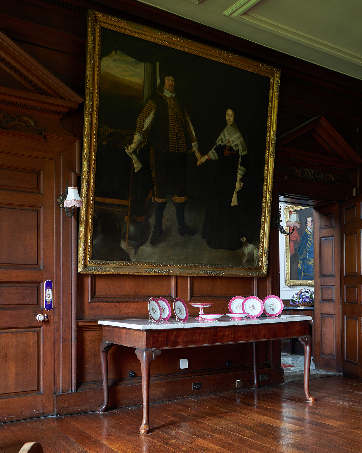 Inline Image - Lot 239: John Souch of Chester (British 1593-1645), ‘Double portrait of Thomas Legh the Elder with his wife Ann Gobarte, he in black coat and breeches trimmed with gold braid, she wearing a black dress and white lace collar, with a spaniel in a landscape’, Oil on canvas | Est. £25,000-35,000 (+ fees)
