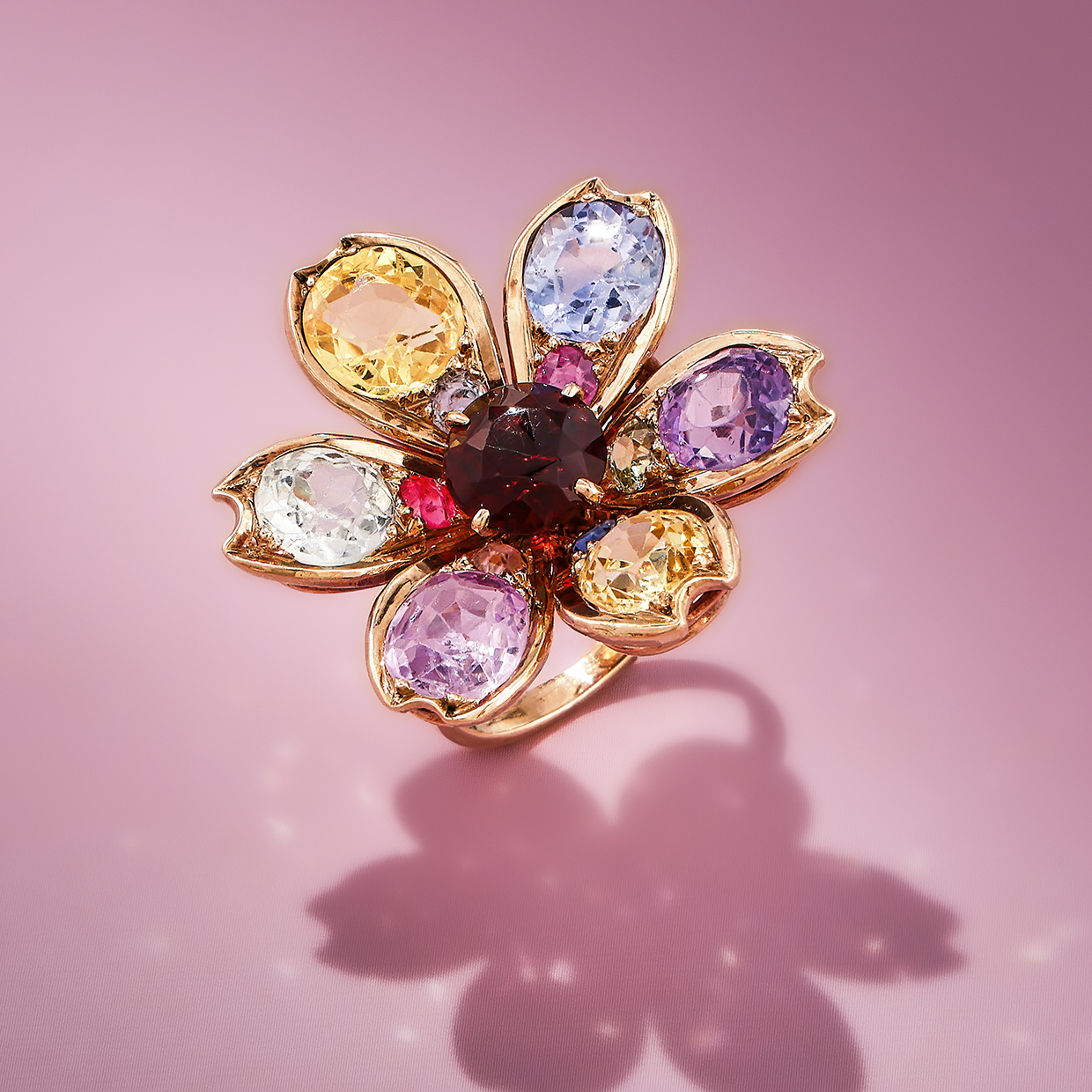 Victor Edelstein and Annamaria Succi Collection - Lot 170 - a multicoloured sapphire and gem set flower ring.jpg