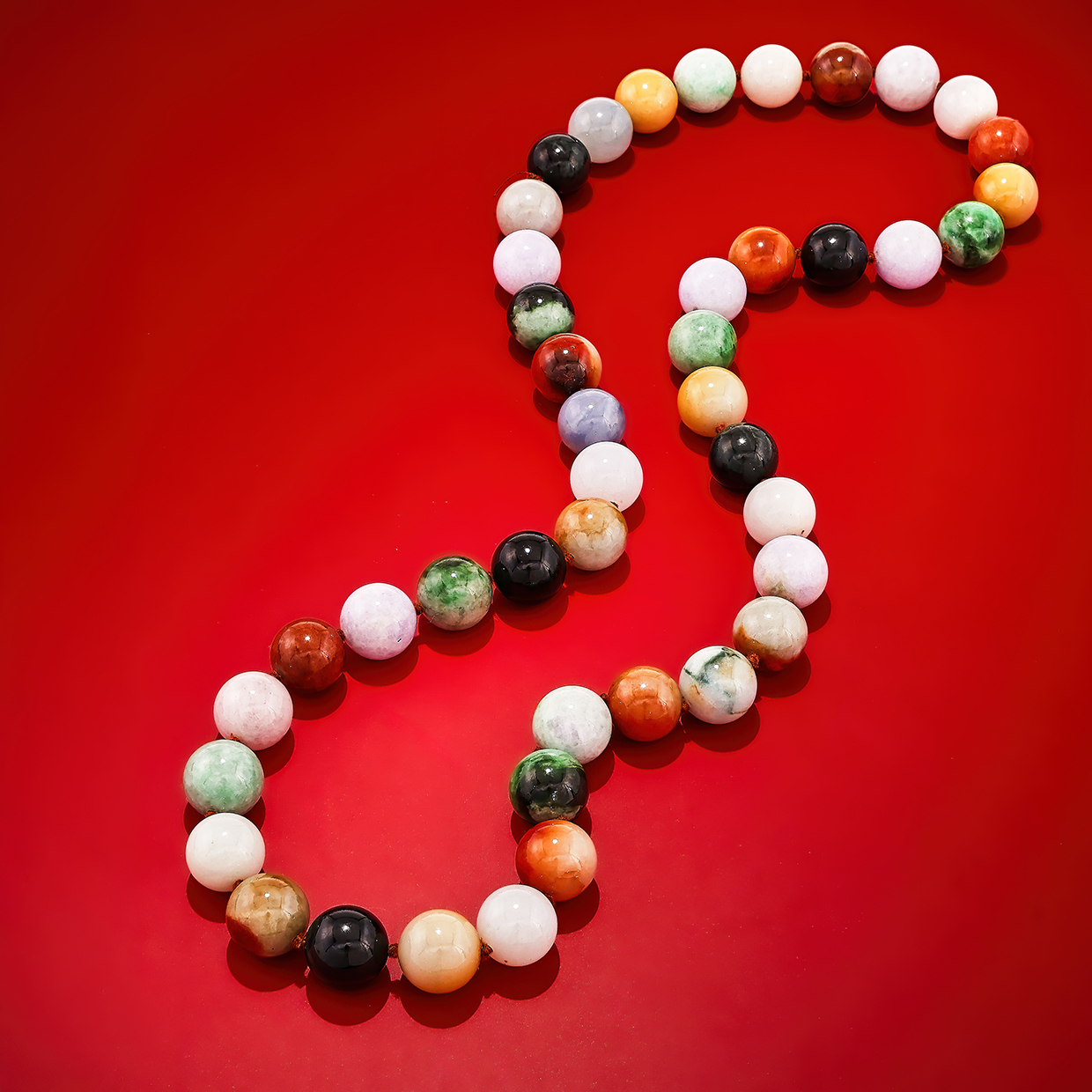 Victor Edelstein and Annamaria Succi Collection - Lot 197 - a jadeite jade and agate bead necklace.jpg