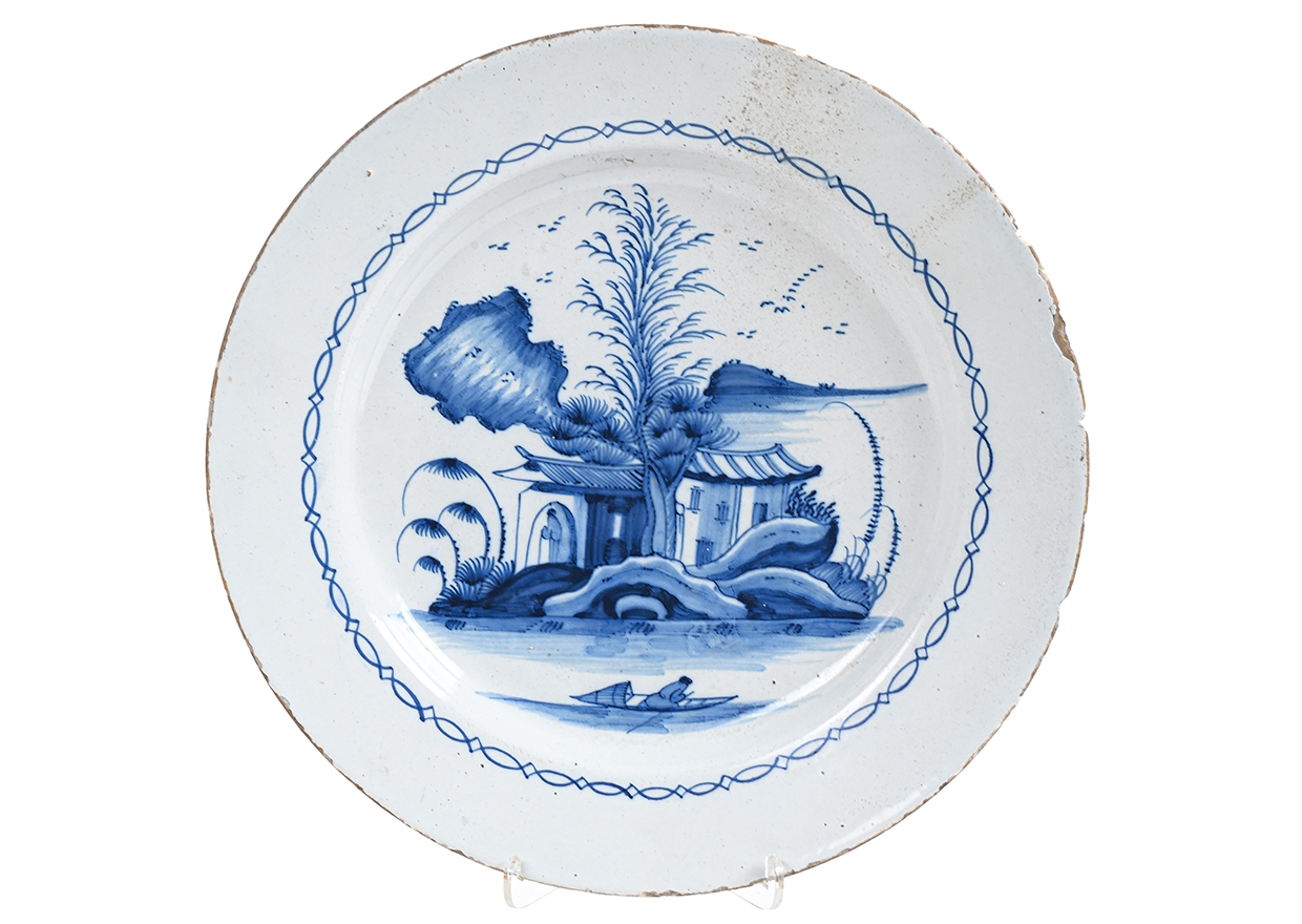 Lot 167 - An English Delft blue and white chinoiserie plate circa 1760.jpg