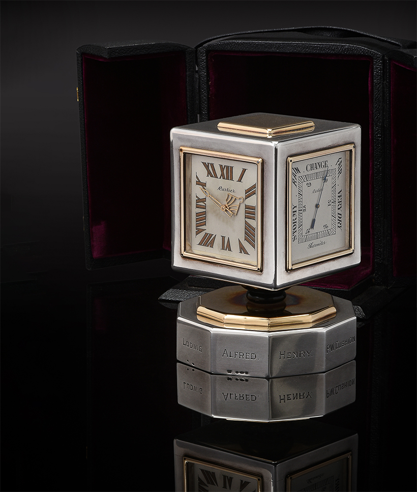 14266 hammer 24k Cartier, a silver, gold and onyx mounted desk clock, perpetual calendar and weather station, import mark for London 1912.jpg