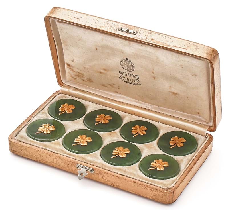 Inline Image - Lot 1: Fabergé, a boxed set of eight nephrite and gold gaming tokens, St. Petersburg, circa 1900 | Est. £6,000-8,000 (+ fees)