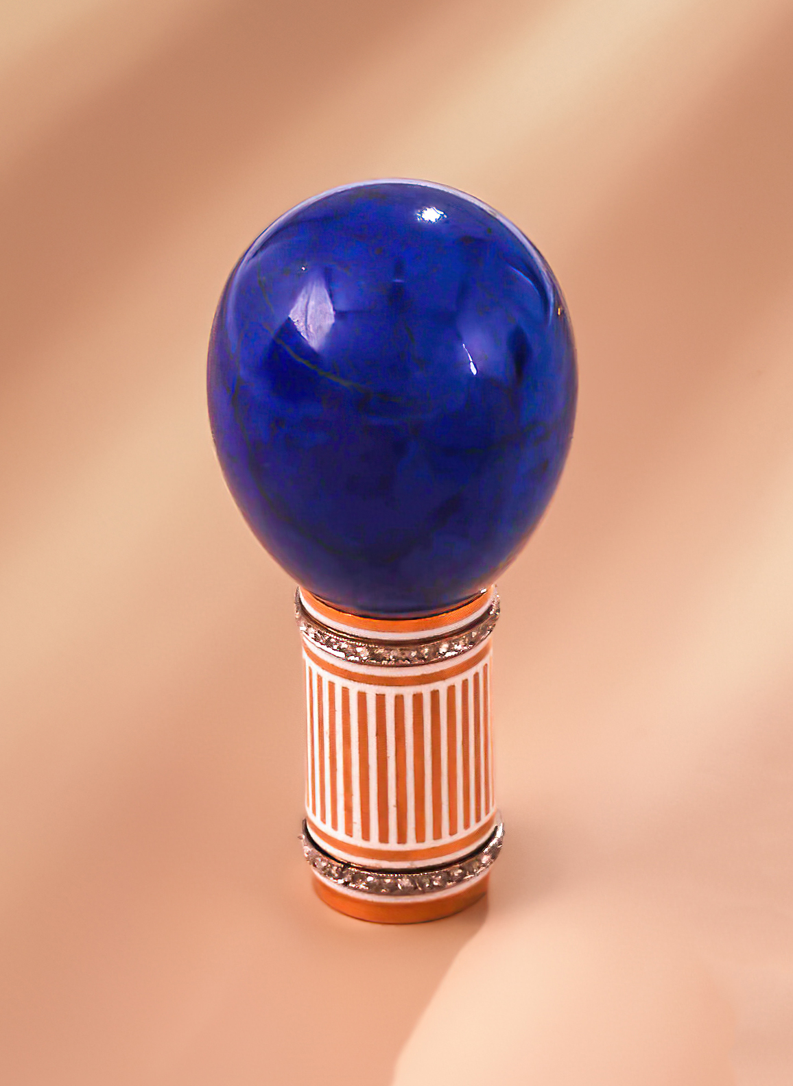 Inline Image - Lot 10: Fabergé, a gold, lapis lazuli, diamond and enamel parasol handle, workmaster Henrik Wigström, St. Petersburg, 1908-1917 | Est. £8,000-12,000 (+ fees)