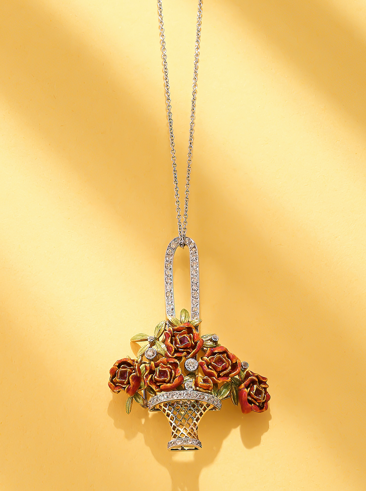 Inline Image - Lot 69: Fabergé, an enamel and diamond pendant, unmarked, circa 1909 | Est. £4,000-6,000 (+ fees)