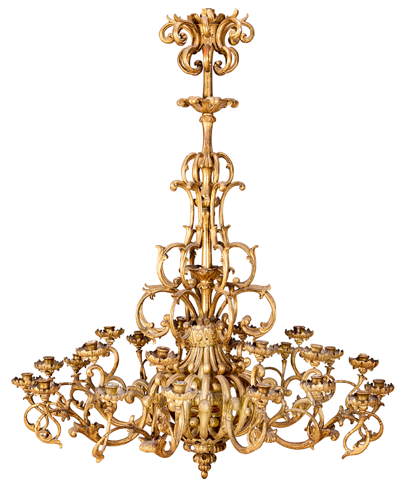 Inline Image - Lot 44: A large Italian Baroque giltwood twenty four light chandelier 18th century | Sold for £27,700