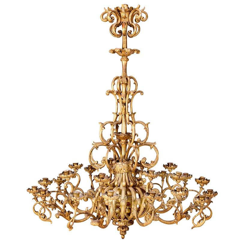 Inline Image - Lot 44: A large Italian Baroque giltwood twenty four light chandelier 18th century | Sold for £27,700