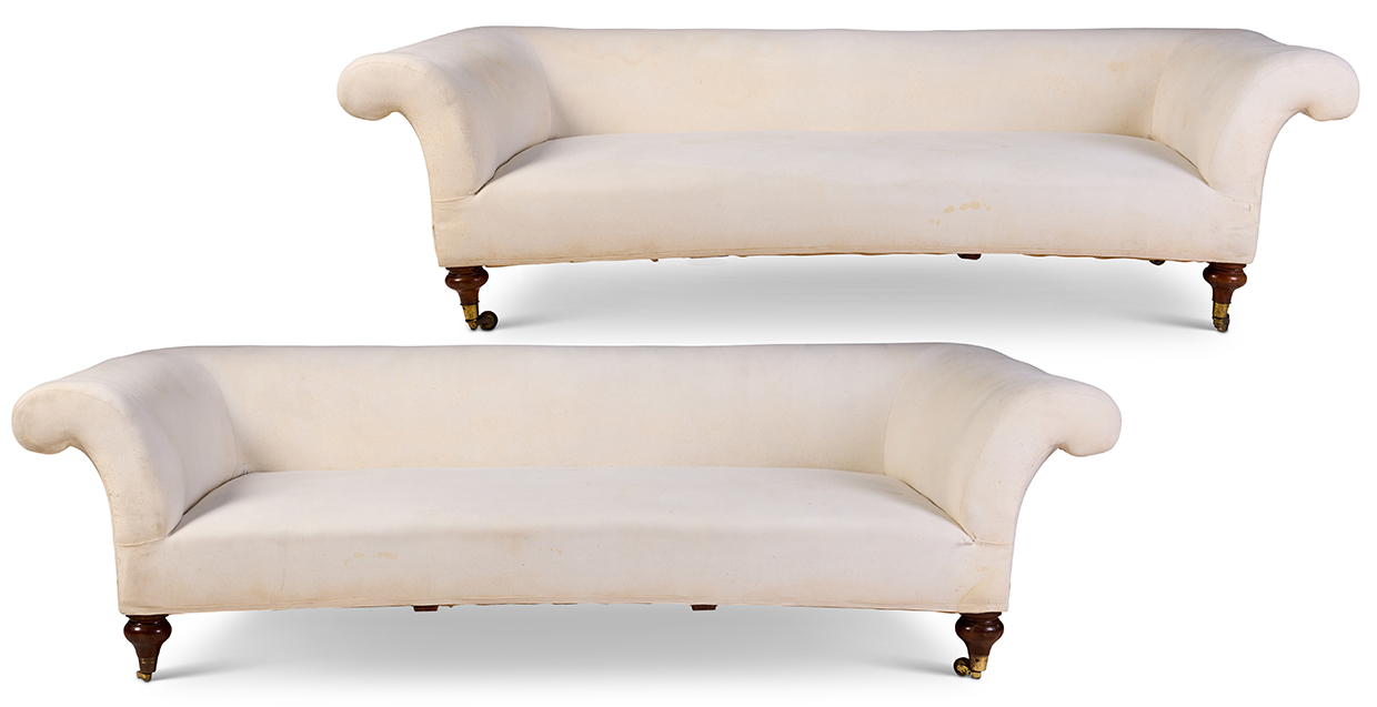 Lot 313 - Melissa Ulfane Collection  - A matched pair of walnut and upholstered sofas, one circa 1860, possibly by Gillows, the other modern by Howard Chairs Ltd.jpg