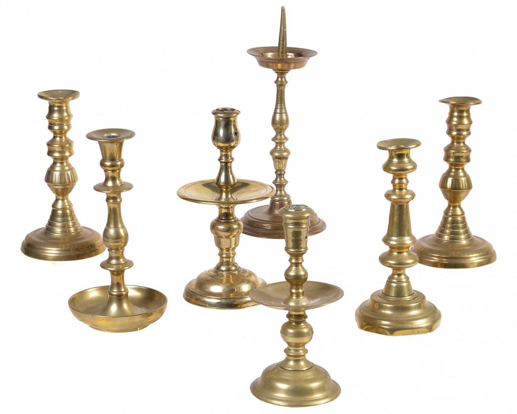 Inline Image - A Dutch brass 'Heemskerk' type candlestick, late 17th century | Similar Dutch brass candlestick | A German or Netherlandish brass pricket candlestick, probably 17th century | A pair of Victorian brass candlesticks, mid-19th century | A brass candlestick in 17th century Spanish style | Est. £400-600 (+fees) (Lot 421)