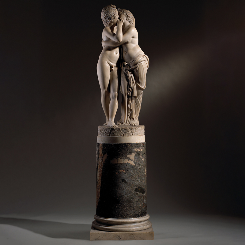 After the antique- a large and rare 18th century white marble figural group of cupid and psyche