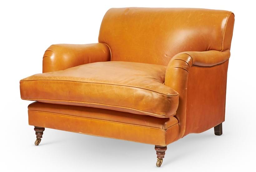 Inline Image - Lot 141: A leather upholstered easy armchair, modern, in the style of Howard & Sons | Est. £600-1,000 (+ fees)