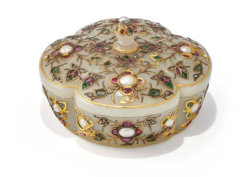 Inline Image - Lot 45: A pale celadon or white jade gem-set quatrefoil box and cover, 18th or 19th century | Est. £3,000-5,000 (+ fees)