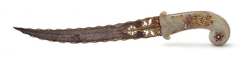 Inline Image - Lot 495: A Mughal ruby and emerald-set jade-hilted dagger (Khanjar), North India, 19th century | Est. £3,000-5,000 (+ fees)