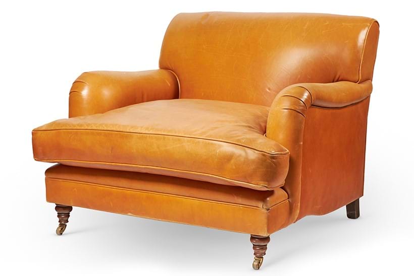 Inline Image - Lot 141: A leather upholstered easy armchair, modern, in the style of Howard & Sons | Est. £600-1,000 (+ fees)