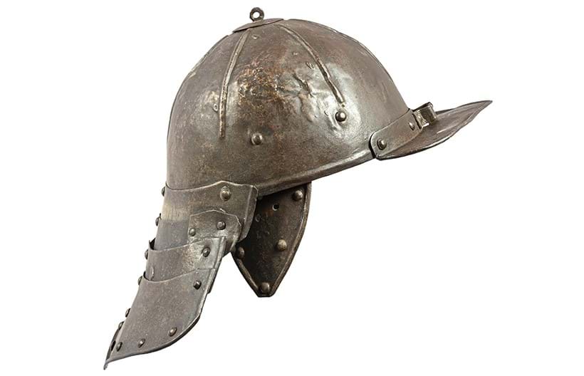 Inline Image - Lot 1063: a Cromwellian Steel 'Lobster-Tailed Pot' Helmet, mid-17th century | Est. £300-500 | Auction date: 29 May 2025