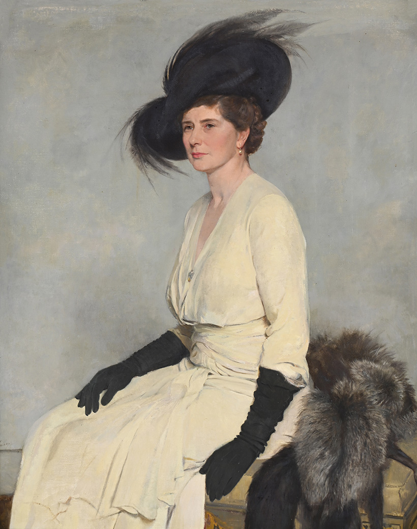 Inline Image - Lot 66: Gerald Festus Kelly (British 1879-1971), 'Portrait of Mrs. Kathleen Mabel Davies-Cooke, Wife of Philip Ralph Davies-Cooke, in a White Dress, Black Hat and Gloves', Oil on Canvas | Est. £10,000-15,000 (+ fees) | Auction date: 11 June 2025