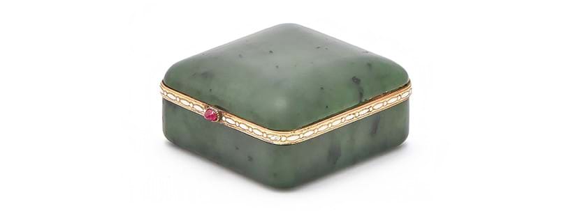 Inline Image - Fabergé, a nephrite, enamel and ruby pill box, workmaster Henrik Wigström, St. Petersburg 1908-17 | Sold for £17,640