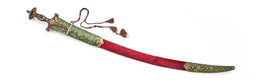 Inline Image - Lot 503: An Indian enamelled gem-set hilted steel sword (Tulwar), possibly Lucknow, early 19th century | Sold for £37,700